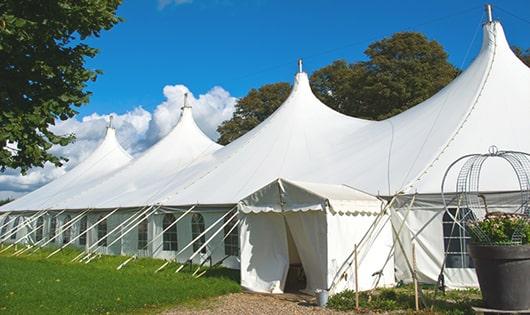 high-quality portable restrooms stationed at a wedding, meeting the needs of guests throughout the outdoor reception in Boggstown, IN